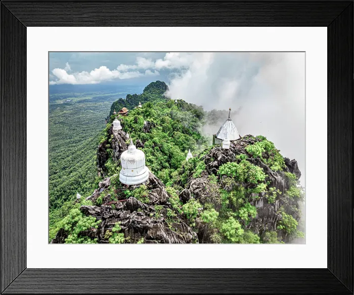 Framed Print : Wat Phra Phutthabat Sutthawat temple pagodas built on tops of giant cliffs, aerial view, Lampang, Thailand Framed Print : Wat Phra Phutthabat Sutthawat temple pagodas built on tops of giant cliffs, aerial view, Lampang, Thailand