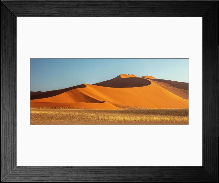 Framed Print : Towering orange sand dunes and blue sky, Sossusvlei, Namib-Naukluft National Park, Namib Desert, Namibia Framed Print : Towering orange sand dunes and blue sky, Sossusvlei, Namib-Naukluft National Park, Namib Desert, Namibia