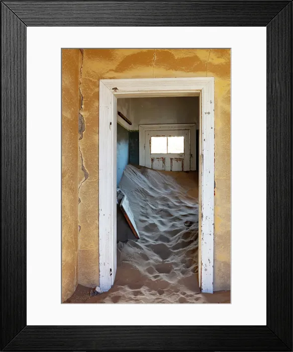 Framed Print : Sand banked inside a room in abandoned diamond mining town, Kolmanskop, Luderitz, Namib Desert, Namibia Framed Print : Sand banked inside a room in abandoned diamond mining town, Kolmanskop, Luderitz, Namib Desert, Namibia