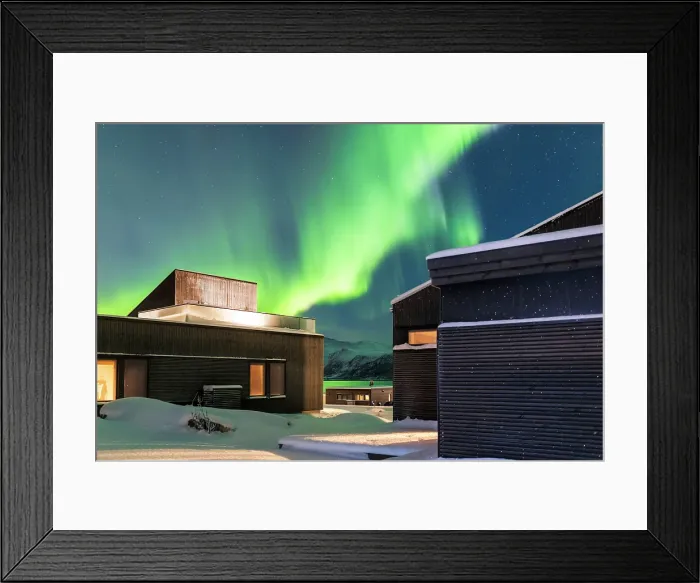 Framed Print : Private modern lodge near Svolvaer on a winter night with the Northern Lights in the sky and the color green reflecting in the fjords Framed Print : Private modern lodge near Svolvaer on a winter night with the Northern Lights in the sky and the color green reflecting in the fjords