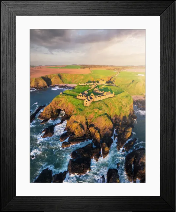 Framed Print : Aerial view of Dunnnottar Castle at sunrise, Stonehaven, Aberdeenshire, Scotland, United Kingdom