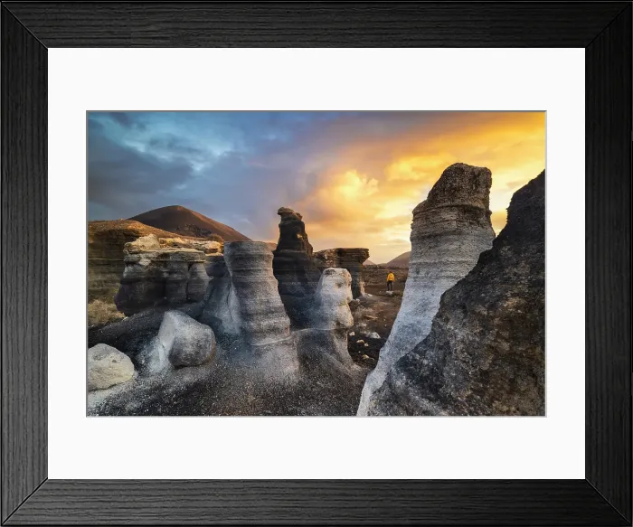 Framed Print : A tourist observes sunrise at Stratified city in Lanzarote, Teseguite, Las Palmas, Lanzarote, Canary Islands, Spain Framed Print : A tourist observes sunrise at Stratified city in Lanzarote, Teseguite, Las Palmas, Lanzarote, Canary Islands, Spain