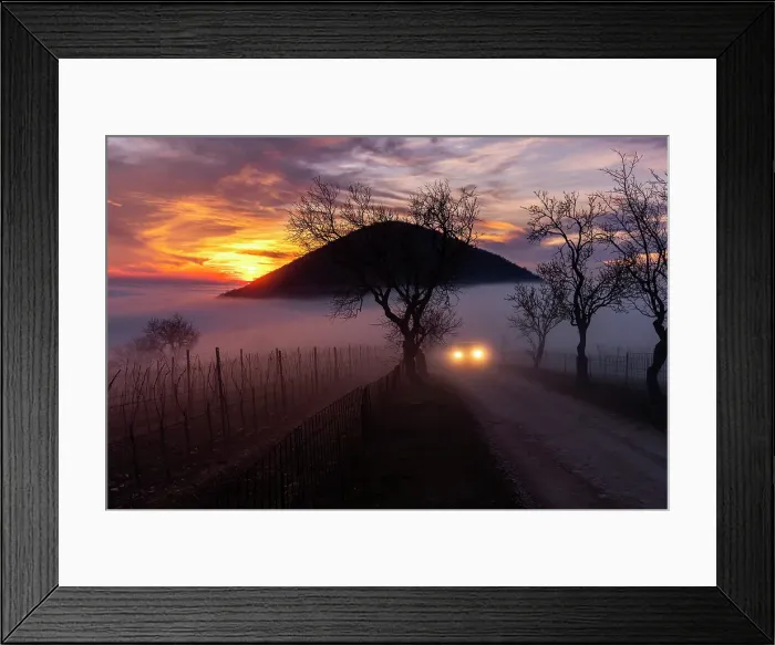 Framed Print : A car in the fog on a dirt road on Mount Fasolo. In the background Monte Rusta, Euganean Hills. Cinto Euganeo, Padova, Veneto, Italy Framed Print : A car in the fog on a dirt road on Mount Fasolo. In the background Monte Rusta, Euganean Hills. Cinto Euganeo, Padova, Veneto, Italy