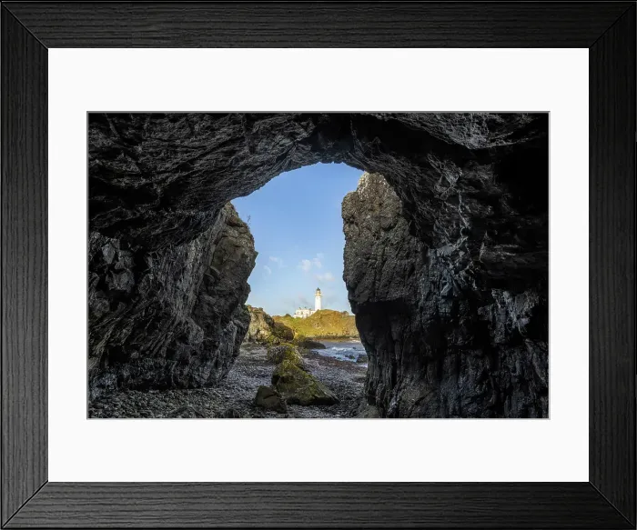 Framed Print : Turberry Lighthouse from within a coastal cave, Turnberry Point, South Ayrshire, Scotland, April 2024 Framed Print : Turberry Lighthouse from within a coastal cave, Turnberry Point, South Ayrshire, Scotland, April 2024