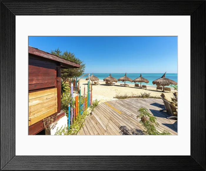 Framed Print : Beachfront huts, colorful fence, relaxing scene. Madagascar, Africa. Anakao Framed Print : Beachfront huts, colorful fence, relaxing scene. Madagascar, Africa. Anakao