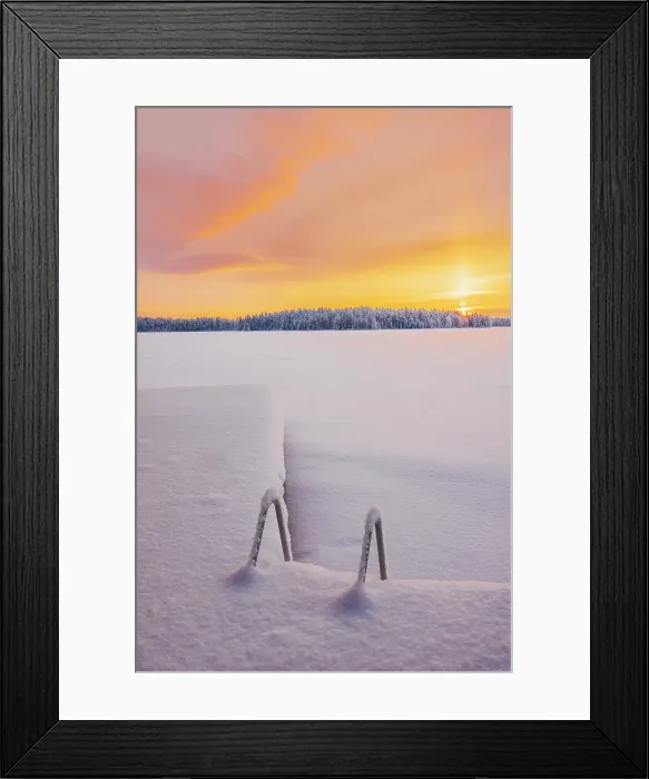 Framed Print : A frozen lake at sunset in a remote area near Ruka in finnish Lapland in winter landscape, Finland Framed Print : A frozen lake at sunset in a remote area near Ruka in finnish Lapland in winter landscape, Finland