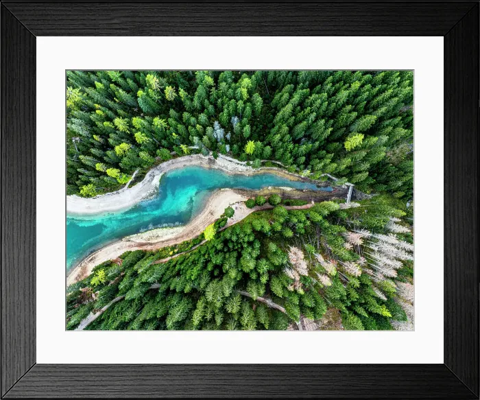 Framed Print : Aerial view of the turquoise colored water of Lake Braies / Pragser Wildsee in a lush autumn forest, Dolomites, South Tyrol, Italy Framed Print : Aerial view of the turquoise colored water of Lake Braies / Pragser Wildsee in a lush autumn forest, Dolomites, South Tyrol, Italy
