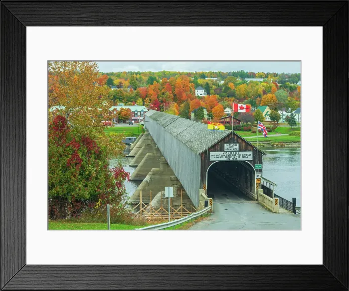 Framed Print : Hartland Covered Bridge is the World's longest covered bridge and crosses the Saint John River Hartland, New Brunswick, Canada Framed Print : Hartland Covered Bridge is the World's longest covered bridge and crosses the Saint John River Hartland, New Brunswick, Canada