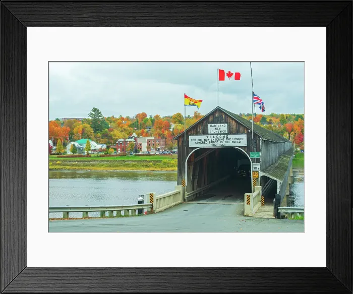 Framed Print : Hartland Covered Bridge is the World's longest covered bridge and crosses the Saint John River Hartland, New Brunswick, Canada Framed Print : Hartland Covered Bridge is the World's longest covered bridge and crosses the Saint John River Hartland, New Brunswick, Canada