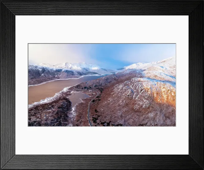 Framed Print : Aerial view over Loch Cuaich along the north coast 500 driving route, A87 between Fort William and the Isle of Skye. Sutherland, Highlands, Scotland, United Kingdom