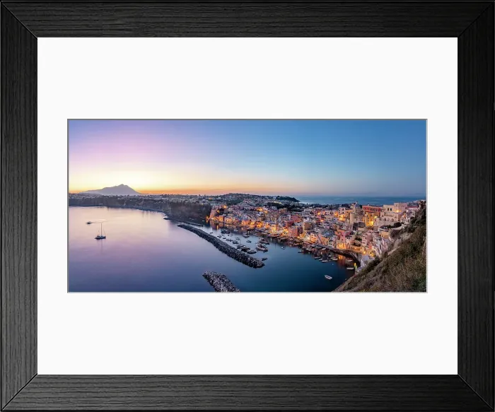 Framed Print : Illuminated houses of La Corricella fishing village and harbor at blue hour, Procida island, Gulf of Naples, Campania, Italy Framed Print : Illuminated houses of La Corricella fishing village and harbor at blue hour, Procida island, Gulf of Naples, Campania, Italy