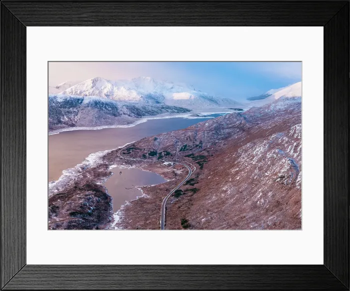 Framed Print : Aerial view over Loch Cuaich along the north coast 500 driving route, A87 between Fort William and the Isle of Skye. Sutherland, Highlands, Scotland, United Kingdom