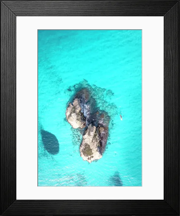 Framed Print : Aerial view of two rock formations in crystal-clear turquoise waters, located off the coast of Salento, Puglia, Italy. Two Sisters. Paddle boarding Framed Print : Aerial view of two rock formations in crystal-clear turquoise waters, located off the coast of Salento, Puglia, Italy. Two Sisters. Paddle boarding