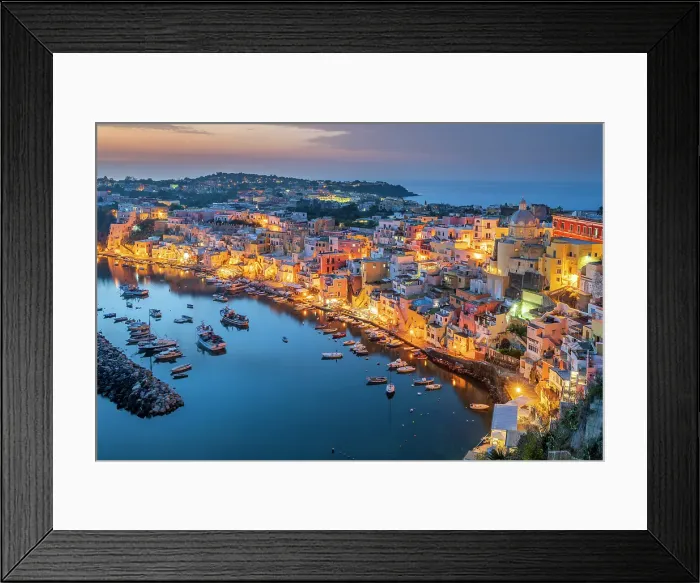 Framed Print : Scenic view of the colorful fishing village of Corricella at dusk, Procida, Campania, Italy Framed Print : Scenic view of the colorful fishing village of Corricella at dusk, Procida, Campania, Italy
