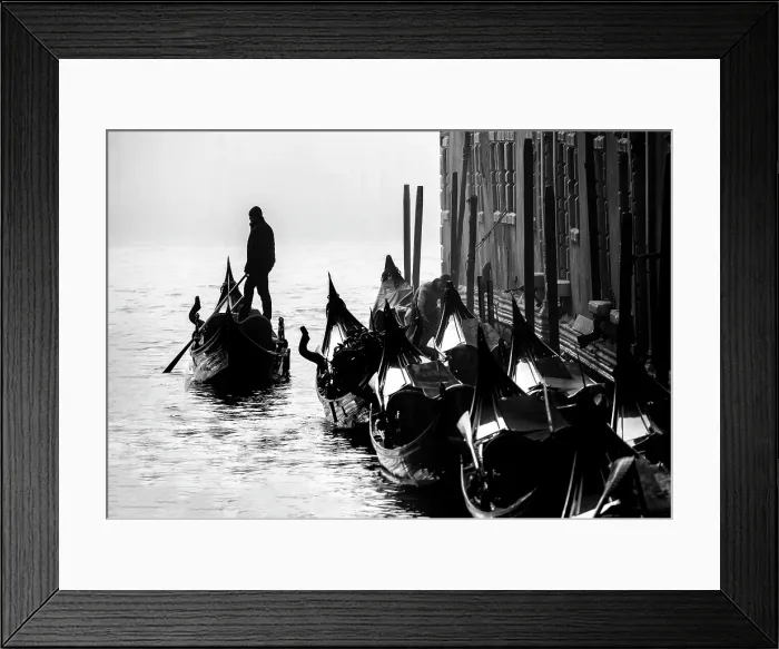 Framed Print : Gondolier in silhouette and parked gondolas, Grand Canal, Venice, Italy Framed Print : Gondolier in silhouette and parked gondolas, Grand Canal, Venice, Italy