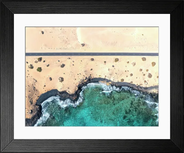 Framed Print : Aerial view of road, desert & sea, Parque Natural de Correlejo, Fuerteventura, Canary Islands, Spain Framed Print : Aerial view of road, desert & sea, Parque Natural de Correlejo, Fuerteventura, Canary Islands, Spain