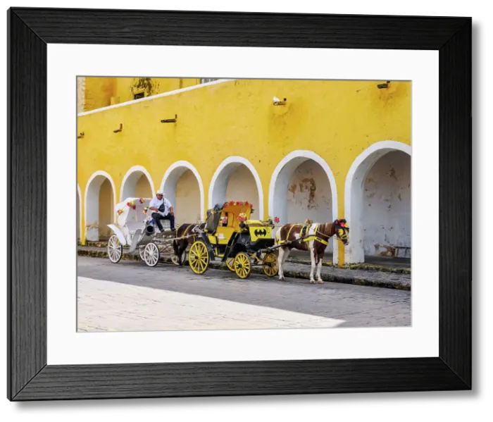 Framed Print : Horse-drawn carriages in front of the Convent of San Antonio de Padua, Izamal, Yucatan State, Mexico Framed Print : Horse-drawn carriages in front of the Convent of San Antonio de Padua, Izamal, Yucatan State, Mexico