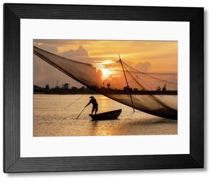 Framed Print : Fisherman checking his net at sunrise, Cua Dai fishing village, near Hoi An, Central Vietnam Framed Print : Fisherman checking his net at sunrise, Cua Dai fishing village, near Hoi An, Central Vietnam