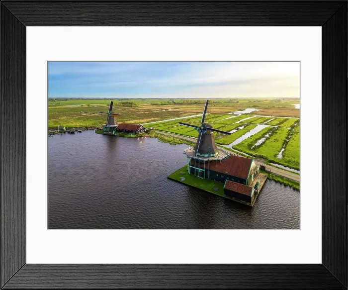Framed Print : Aerial view of the typical windmills of Zaanse Schans on the river Zaan in spring. Zaanse Schans, North Holland, Zaanstad municipality, The Netherlands, Europe Framed Print : Aerial view of the typical windmills of Zaanse Schans on the river Zaan in spring. Zaanse Schans, North Holland, Zaanstad municipality, The Netherlands, Europe