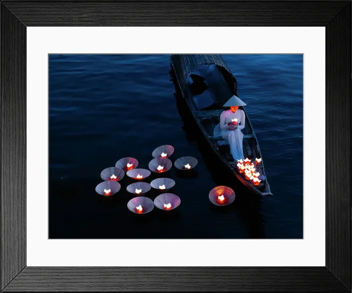 Framed Print : Woman laying floating lanterns on the Perfume River at dusk, Hue, Central Vietnam Framed Print : Woman laying floating lanterns on the Perfume River at dusk, Hue, Central Vietnam