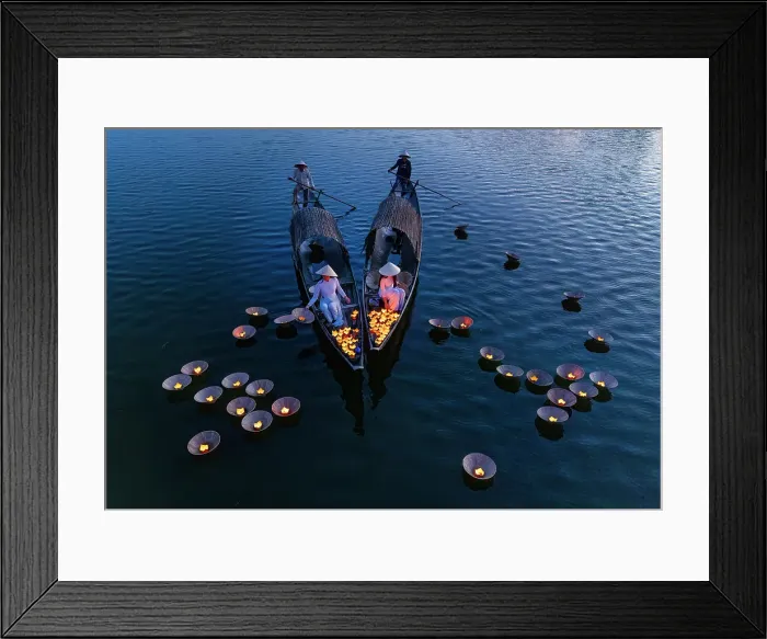 Framed Print : Women laying floating lanterns on the Perfume River at dusk, Hue, Central Vietnam Framed Print : Women laying floating lanterns on the Perfume River at dusk, Hue, Central Vietnam