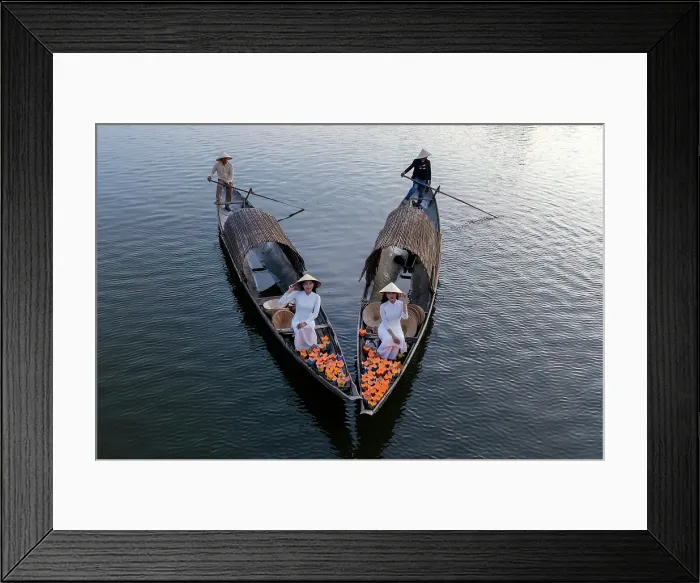 Framed Print : Women laying floating lanterns on the Perfume River at dusk, Hue, Central Vietnam Framed Print : Women laying floating lanterns on the Perfume River at dusk, Hue, Central Vietnam
