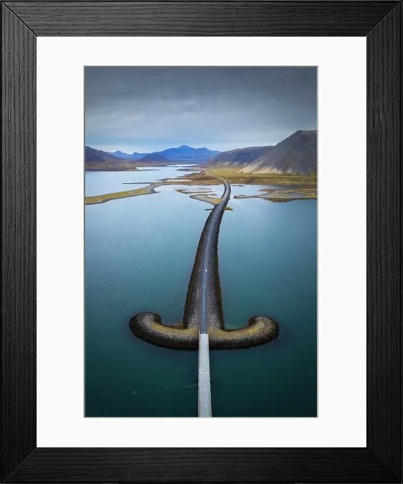 Framed Print : Aerial view of the sword shaped bridge Snæfellsnesvegur close to the town of Grudarfjordur, Snaefellsnes peninsula, Iceland Framed Print : Aerial view of the sword shaped bridge Snæfellsnesvegur close to the town of Grudarfjordur, Snaefellsnes peninsula, Iceland