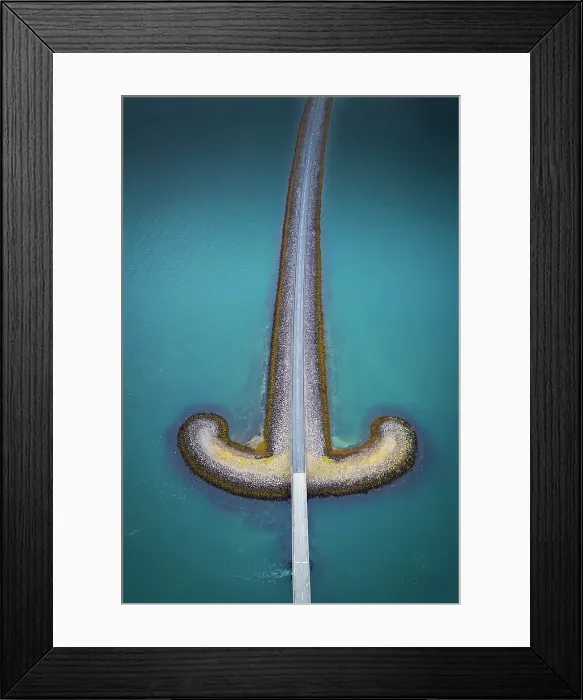 Framed Print : Aerial view of the sword shaped bridge Snæfellsnesvegur close to the town of Grudarfjordur, Snaefellsnes peninsula, Iceland Framed Print : Aerial view of the sword shaped bridge Snæfellsnesvegur close to the town of Grudarfjordur, Snaefellsnes peninsula, Iceland