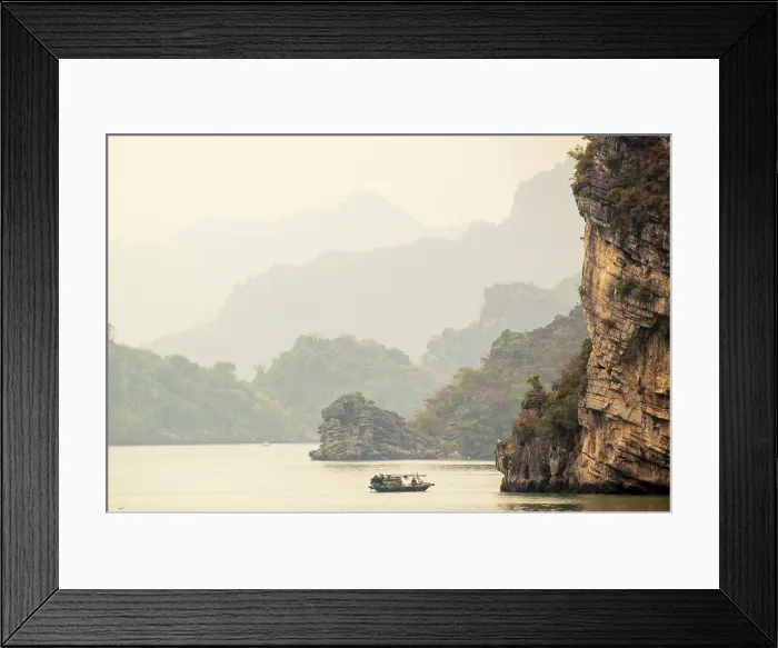Framed Print : Traditional fishing boat and limestone islands at dawn, Halong Bay, Northeast Vietnam Framed Print : Traditional fishing boat and limestone islands at dawn, Halong Bay, Northeast Vietnam