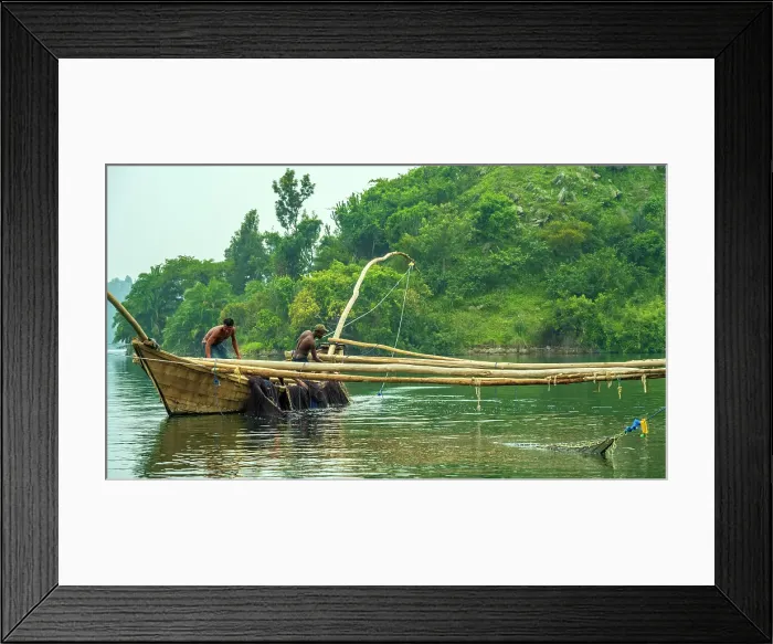 Framed Print : africa, Rwanda, Kivu Lake. Fishermen on traditional fishing boats in the middle of the lake near to an island Framed Print : africa, Rwanda, Kivu Lake. Fishermen on traditional fishing boats in the middle of the lake near to an island