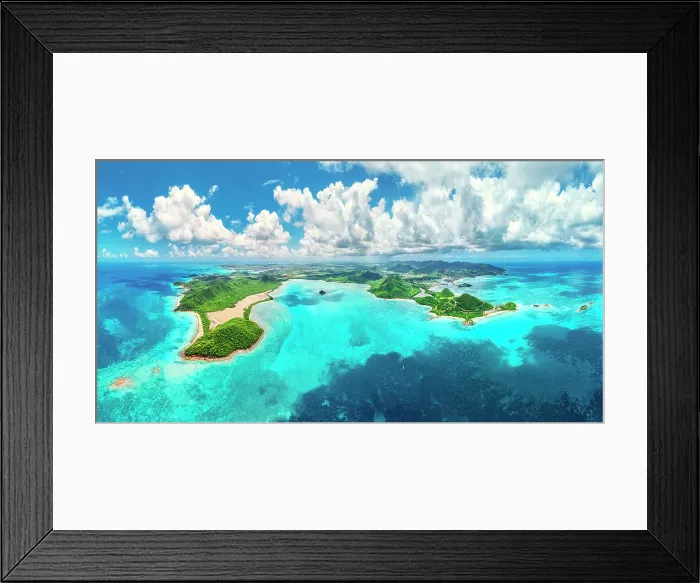 Framed Print : Panoramic aerial view of fluffy clouds over Pearns Hill, Five Islands Harbour and Maiden Island, Antigua, Caribbean, West Indies Framed Print : Panoramic aerial view of fluffy clouds over Pearns Hill, Five Islands Harbour and Maiden Island, Antigua, Caribbean, West Indies