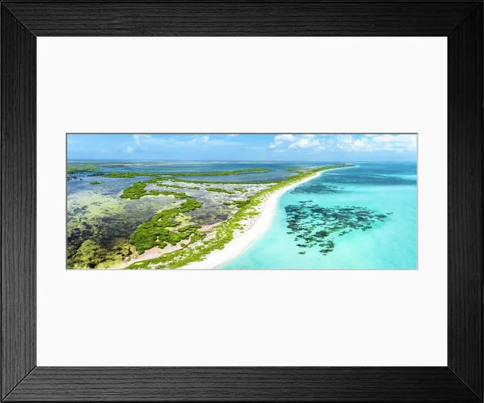 Framed Print : Aerial view of idyllic tropical shore overlooking the crystal Caribbean Sea and lagoon, Barbuda, Antigua & Barbuda, West Indies Framed Print : Aerial view of idyllic tropical shore overlooking the crystal Caribbean Sea and lagoon, Barbuda, Antigua & Barbuda, West Indies