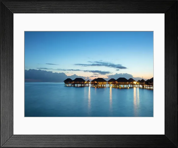 Framed Print : Stilted over-water hotel suites at dusk, Taha'a, Society Islands, Pacific Ocean, French Polynesia
