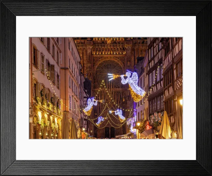 Framed Print : The Christmas market, decorations and illuminations, Merciere street and the cathedral. Strasbourg, Alsace, Bas-Rhin, France Framed Print : The Christmas market, decorations and illuminations, Merciere street and the cathedral. Strasbourg, Alsace, Bas-Rhin, France