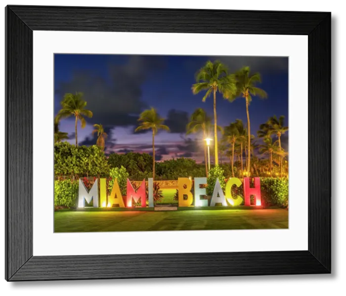Framed Print : Miami Beach Sign at Ocean Drive Art Deco District, illuminated with iconic Neon Colors South Beach, Miami Beach, Florida, USA Framed Print : Miami Beach Sign at Ocean Drive Art Deco District, illuminated with iconic Neon Colors South Beach, Miami Beach, Florida, USA