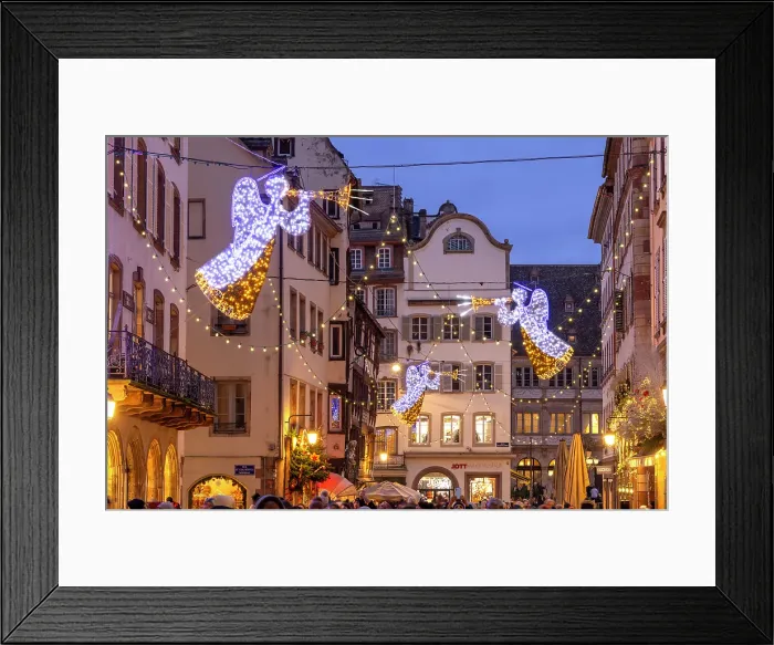 Framed Print : The Christmas market, decorations and illuminations, Merciere street and the cathedral. Strasbourg, Alsace, Bas-Rhin, France Framed Print : The Christmas market, decorations and illuminations, Merciere street and the cathedral. Strasbourg, Alsace, Bas-Rhin, France