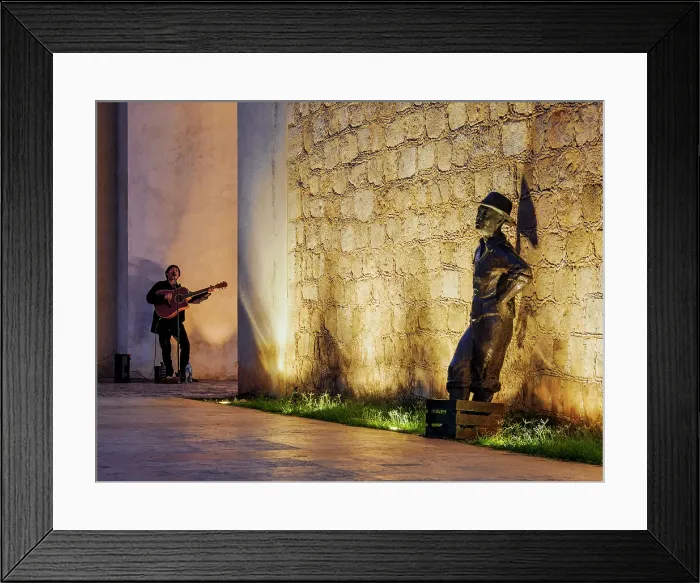 Framed Print : Fishmonger statue and the musician playing guitar at Puerta de Mar at dusk, Campeche City, Campeche State, Mexico Framed Print : Fishmonger statue and the musician playing guitar at Puerta de Mar at dusk, Campeche City, Campeche State, Mexico