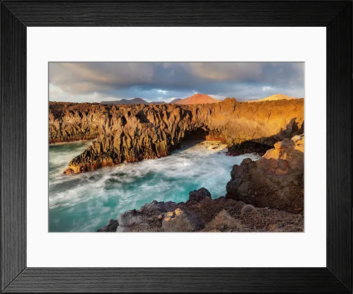 Framed Print : The volcanic coastline at Los Hervideros bathed in evening light, Yaiza, Timanfaya National Park, Lanzarote, Canary Islands, Spain Framed Print : The volcanic coastline at Los Hervideros bathed in evening light, Yaiza, Timanfaya National Park, Lanzarote, Canary Islands, Spain