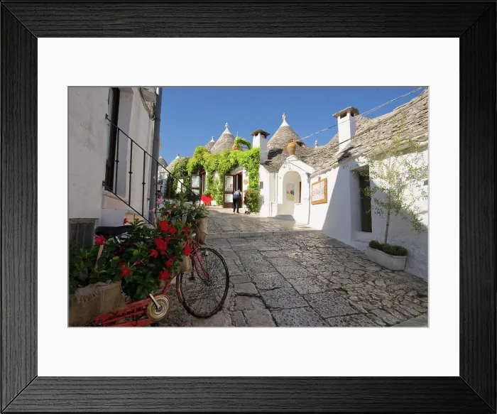 Framed Print : Italy, Apulia, Bari district, Itria Valley. Alberobello. Trulli (typical houses) Framed Print : Italy, Apulia, Bari district, Itria Valley. Alberobello. Trulli (typical houses)