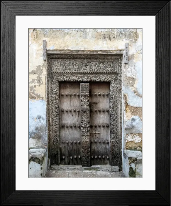 Framed Print : Old heavy carved wooden door, Stonetown, Zanzibar, Tanzania Framed Print : Old heavy carved wooden door, Stonetown, Zanzibar, Tanzania