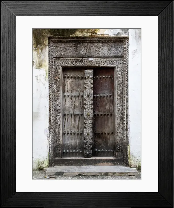 Framed Print : Old heavy carved wooden door, Stonetown, Zanzibar, Tanzania Framed Print : Old heavy carved wooden door, Stonetown, Zanzibar, Tanzania