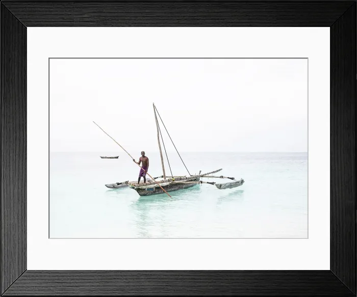 Framed Print : Local fisherman on his old wooden dhow, Nungwi, Zanzibar, Tanzania Framed Print : Local fisherman on his old wooden dhow, Nungwi, Zanzibar, Tanzania