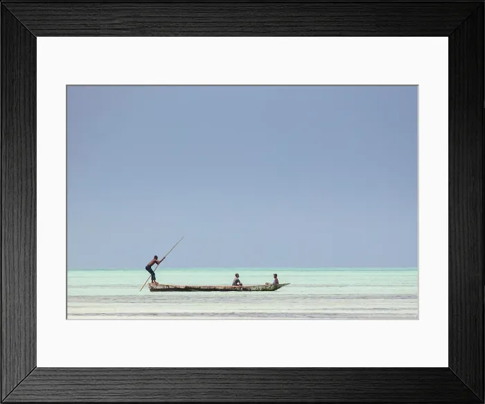 Framed Print : Local fishermen in an open wooden boat on the sea, Jambiani, Zanzibar, Tanzania Framed Print : Local fishermen in an open wooden boat on the sea, Jambiani, Zanzibar, Tanzania