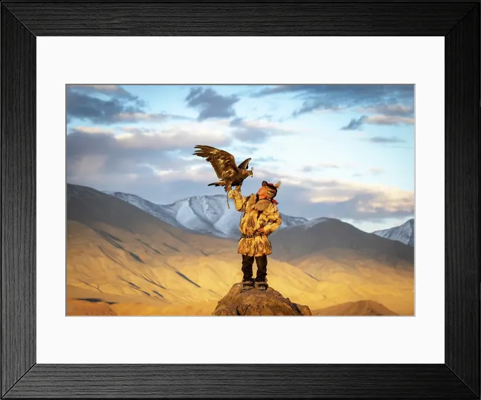 Framed Print : Kazakh Eagle Hunter with his Golden Eagle at sunset against a mountainous backdrop, Western Mongolia, Asia Framed Print : Kazakh Eagle Hunter with his Golden Eagle at sunset against a mountainous backdrop, Western Mongolia, Asia