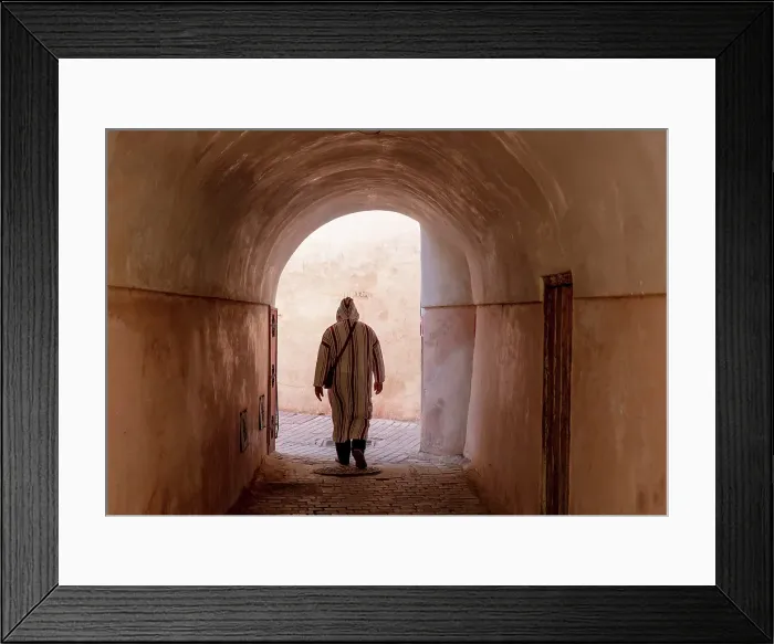 Framed Print : Local man in djellaba, walking through an alleyway on cobbled street, Medina, Marrakech, Morocco Framed Print : Local man in djellaba, walking through an alleyway on cobbled street, Medina, Marrakech, Morocco