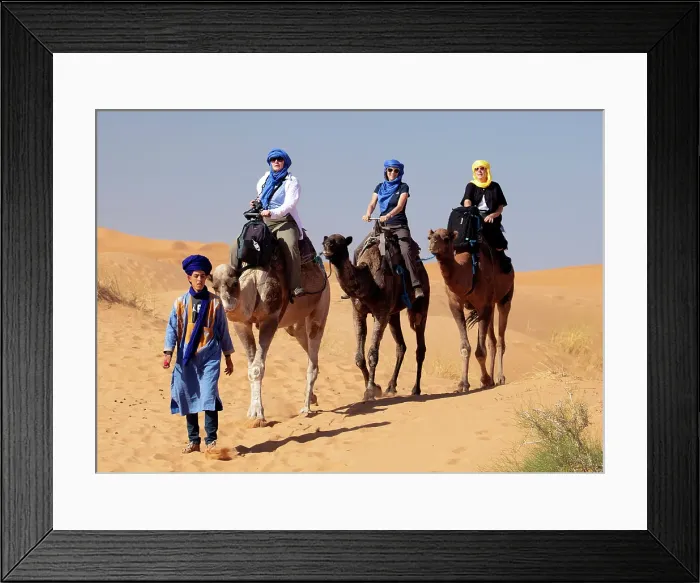 Framed Print : Tourists riding camels, Erg Chebbi, Sahara Desert, near Merzouga, Morocco Framed Print : Tourists riding camels, Erg Chebbi, Sahara Desert, near Merzouga, Morocco