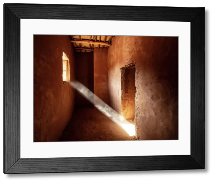 Framed Print : Shaft of sunlight shining through the window of a dusty room, Kasbah Ait Ben Haddou, near Ouarzazate, Morocco