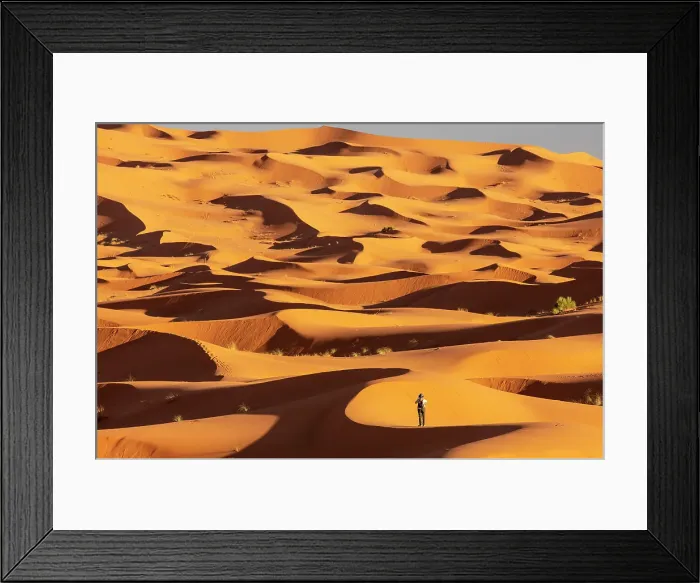 Framed Print : Tourist taking photographs of the dunes of the Erg Chebbi sand sea, Sahara Desert, near Merzouga, Morocco (MR) Framed Print : Tourist taking photographs of the dunes of the Erg Chebbi sand sea, Sahara Desert, near Merzouga, Morocco (MR)