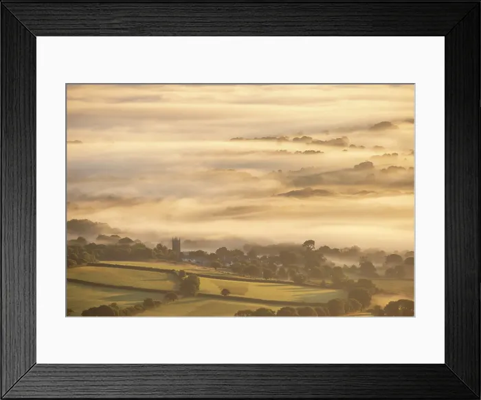 Framed Print : The village and church of South Tawton on a misty summer morning, Dartmoor National Park, Devon, England. Summer (August) 2024 Framed Print : The village and church of South Tawton on a misty summer morning, Dartmoor National Park, Devon, England. Summer (August) 2024