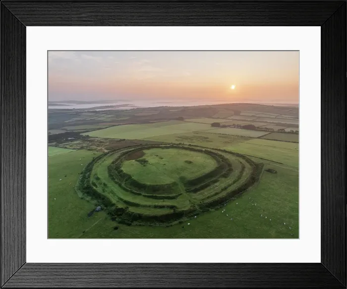 Framed Print : Aerial view of Castle an Dinas, a Cornish Iron Age Hillfort, at sunrise, Cornwall, England. Summer (August) 2024 Framed Print : Aerial view of Castle an Dinas, a Cornish Iron Age Hillfort, at sunrise, Cornwall, England. Summer (August) 2024